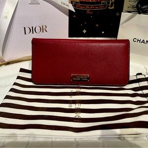 Henri Bendel gorgeous red with gold hardware ware long wallet and dust bag. EUC